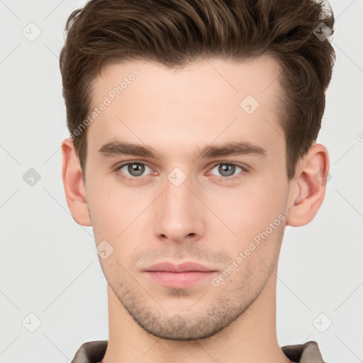 Neutral white young-adult male with short  brown hair and brown eyes