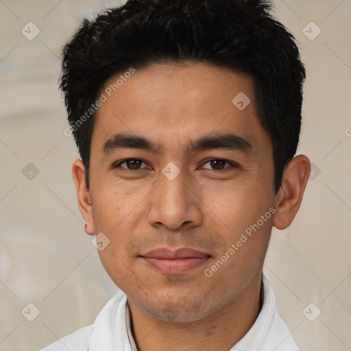 Joyful asian young-adult male with short  black hair and brown eyes