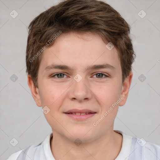 Joyful white child male with short  brown hair and brown eyes