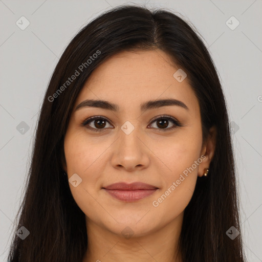 Joyful latino young-adult female with long  brown hair and brown eyes