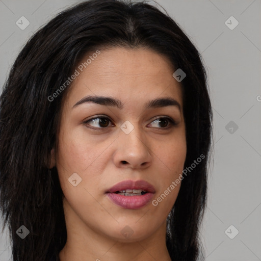 Joyful asian young-adult female with long  brown hair and brown eyes