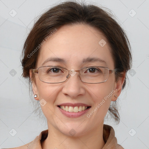 Joyful white adult female with medium  brown hair and brown eyes