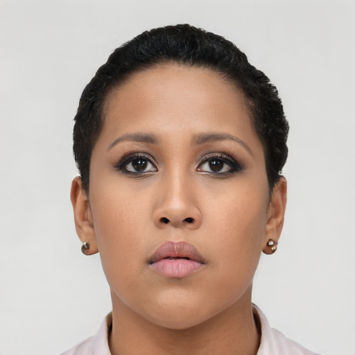 Neutral latino young-adult female with short  black hair and brown eyes