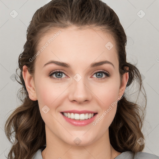 Joyful white young-adult female with medium  brown hair and green eyes