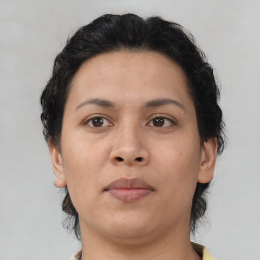 Neutral asian adult female with medium  brown hair and brown eyes