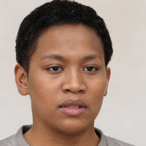 Neutral latino young-adult female with short  brown hair and brown eyes