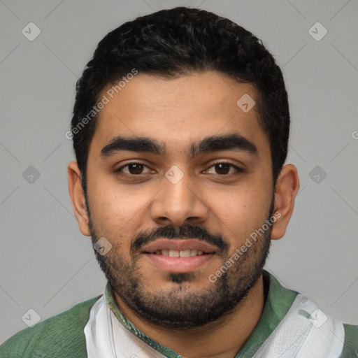 Joyful latino young-adult male with short  black hair and brown eyes