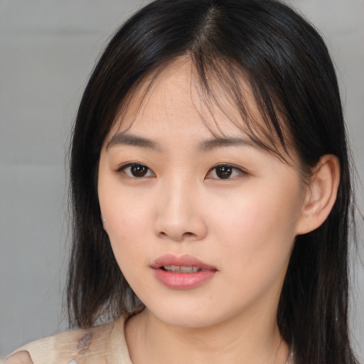 Neutral asian young-adult female with medium  brown hair and brown eyes
