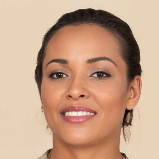 Joyful white young-adult female with medium  brown hair and brown eyes