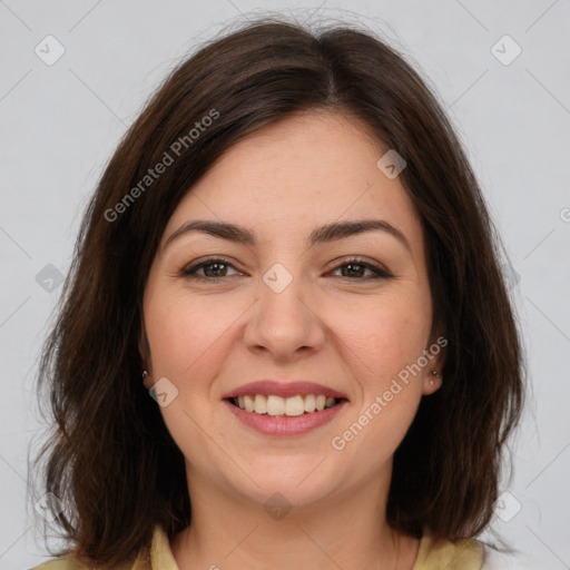 Joyful white young-adult female with medium  brown hair and brown eyes