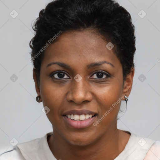 Joyful black young-adult female with short  black hair and brown eyes