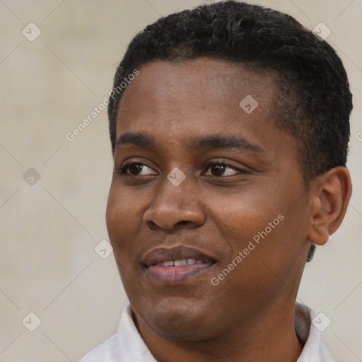 Joyful black young-adult male with short  black hair and brown eyes