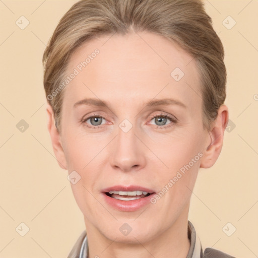 Joyful white adult female with short  brown hair and brown eyes