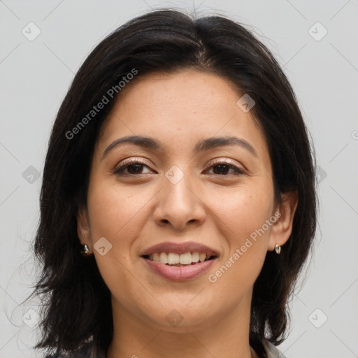 Joyful asian young-adult female with long  brown hair and brown eyes