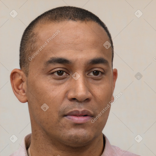 Neutral latino young-adult male with short  brown hair and brown eyes