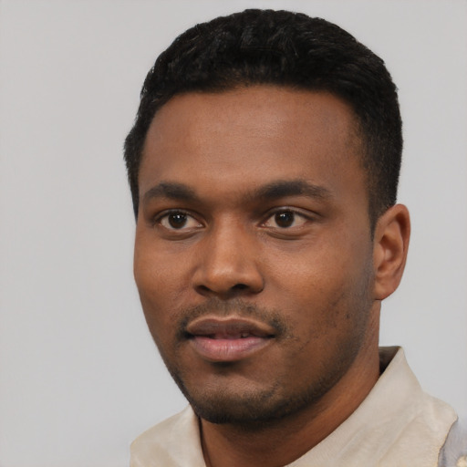 Neutral black young-adult male with short  black hair and brown eyes