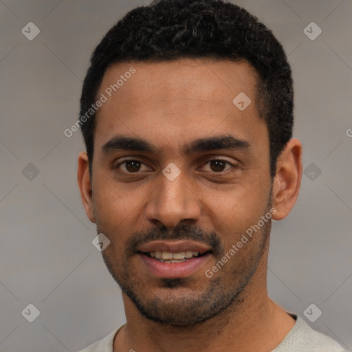 Joyful latino young-adult male with short  black hair and brown eyes