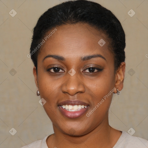 Joyful black young-adult female with short  black hair and brown eyes