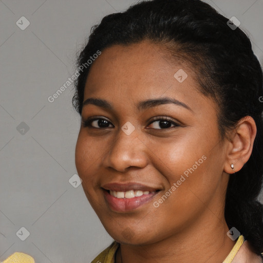 Joyful latino young-adult female with short  black hair and brown eyes