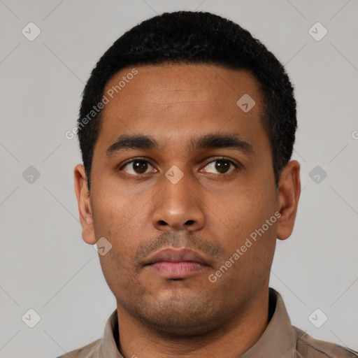 Neutral latino young-adult male with short  black hair and brown eyes