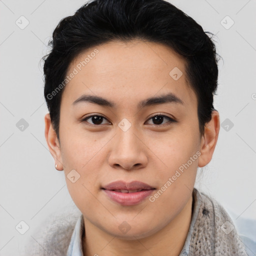 Joyful asian young-adult female with short  brown hair and brown eyes