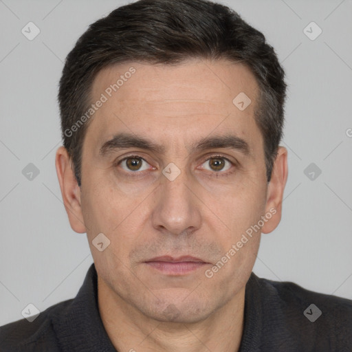 Neutral white adult male with short  brown hair and brown eyes