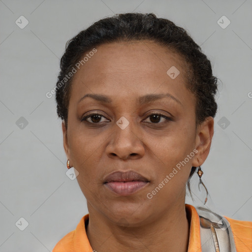 Neutral black adult female with short  black hair and brown eyes