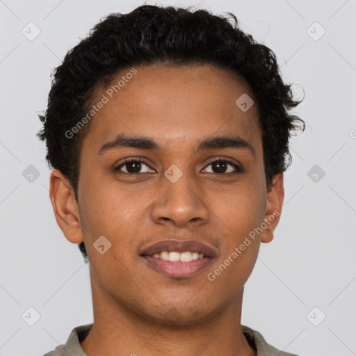 Joyful latino young-adult male with short  brown hair and brown eyes