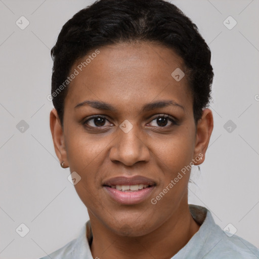 Joyful black young-adult female with short  black hair and brown eyes