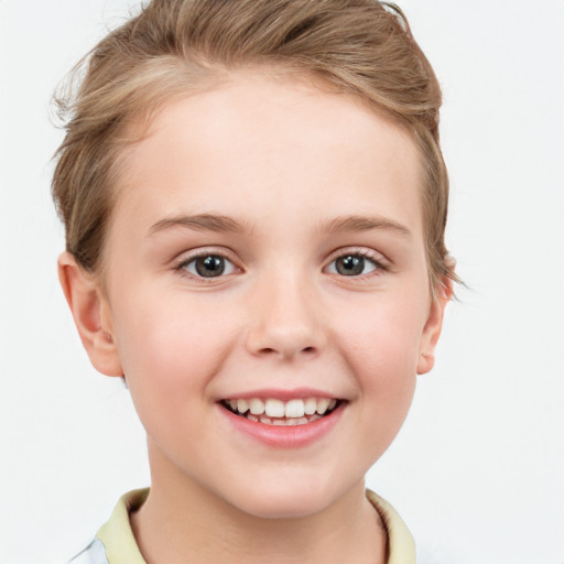 Joyful white child female with short  brown hair and grey eyes