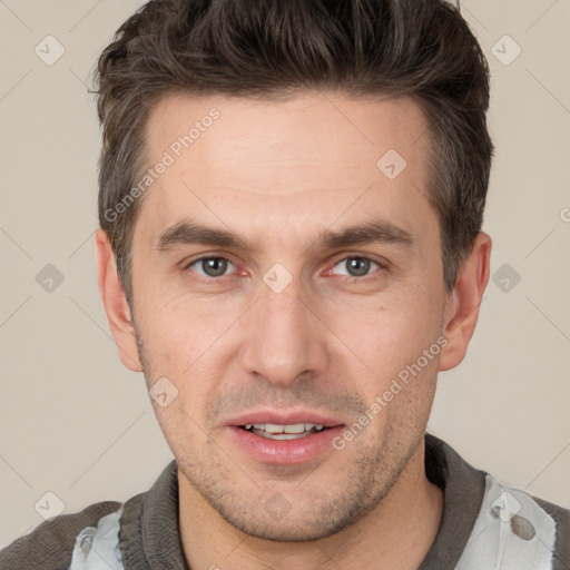 Joyful white adult male with short  brown hair and brown eyes