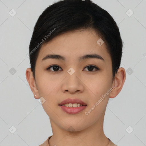 Joyful asian young-adult female with short  black hair and brown eyes