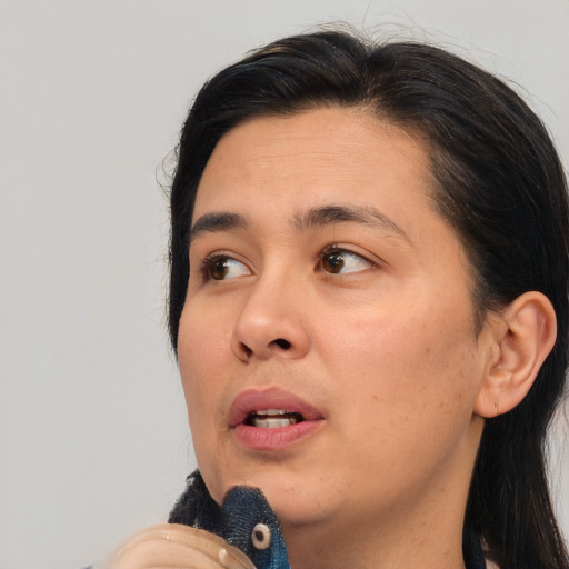Neutral asian young-adult female with long  brown hair and brown eyes