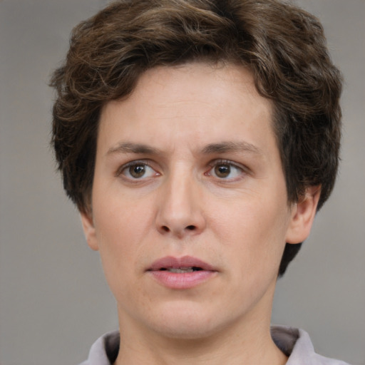 Neutral white adult female with short  brown hair and brown eyes