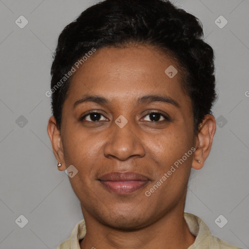 Joyful black young-adult female with short  black hair and brown eyes