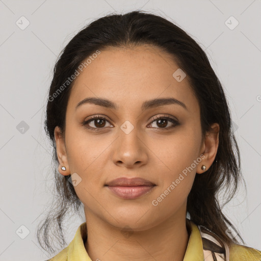 Joyful latino young-adult female with medium  brown hair and brown eyes