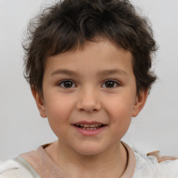 Joyful white child male with short  brown hair and brown eyes