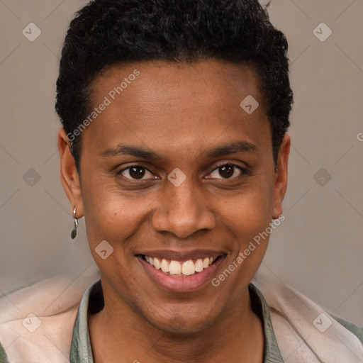 Joyful black young-adult male with short  brown hair and brown eyes