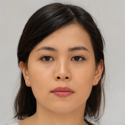 Neutral asian young-adult female with medium  brown hair and brown eyes