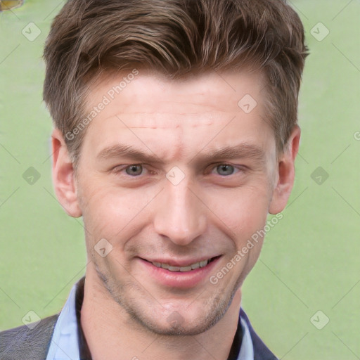 Joyful white adult male with short  brown hair and grey eyes