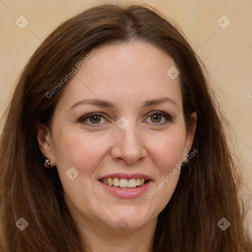 Joyful white adult female with long  brown hair and brown eyes