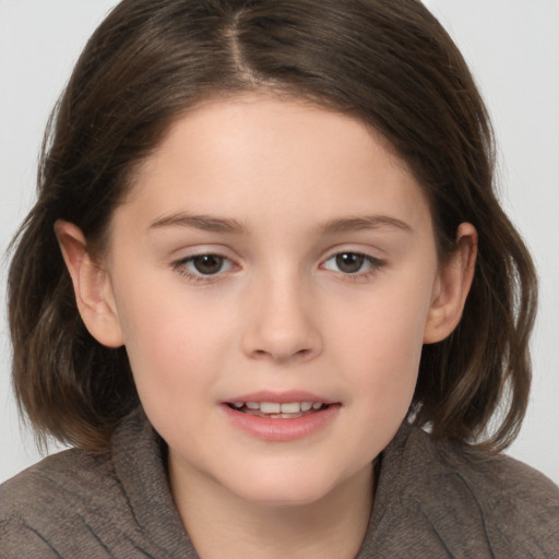 Joyful white child female with medium  brown hair and brown eyes