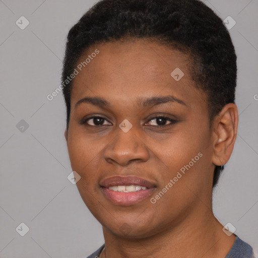 Joyful black young-adult female with short  black hair and brown eyes