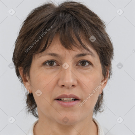 Joyful white adult female with medium  brown hair and brown eyes