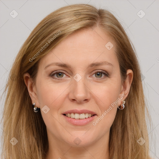 Joyful white adult female with long  brown hair and grey eyes