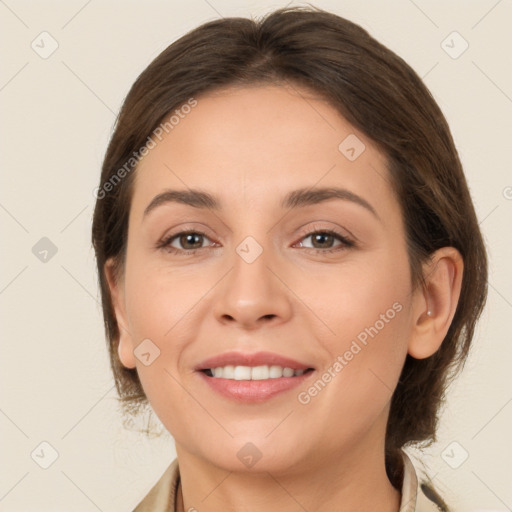 Joyful white young-adult female with long  brown hair and brown eyes