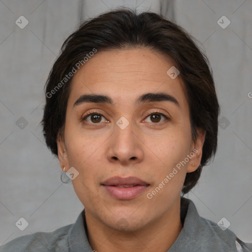 Joyful white adult female with medium  brown hair and brown eyes