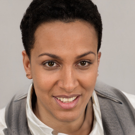 Joyful white young-adult female with short  brown hair and brown eyes