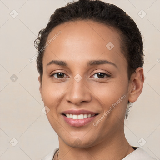 Joyful white young-adult female with short  brown hair and brown eyes