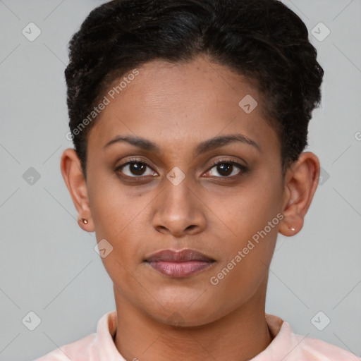 Joyful latino young-adult female with short  brown hair and brown eyes